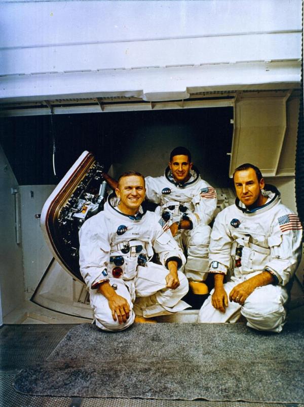 William Anders poses with the Apollo 8 crew co<em></em>nsisting of Commander Fran Norman (left) and Command Module Pilot James Lovell (right).