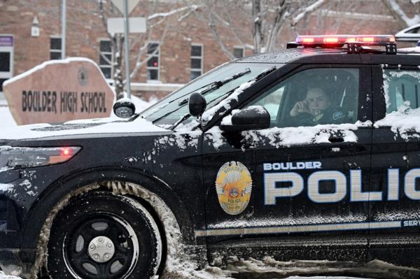  A Boulder police officer sits in her cruiser outside of Boulder High School in respo<em></em>nse to an unco<em></em>nfirmed report of a person with a gun at the school on February 22, 2023 in Boulder, Colorado