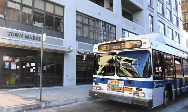 Another photo, showing a b63 bus parked just outside Town Market.