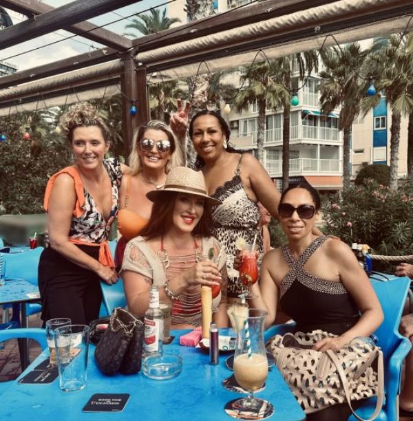 PIC FROM Kennedy News and Media (PICTURED: LISA CONNOR, 47, AND THE OTHER MUMS ON HER GIRLS' TRIP.) A mum heading to Benidorm brags that she lied a<em></em>bout havin<em></em>g a SCALP Co<em></em>nDITION to blag her way past a 'jobsworth' receptio<em></em>nist enforcing a 'no hair roller' dress code for Manchester Airport's swanky lounge. Lisa Connor, from Sandbach, Cheshire, was travelling with rollers in to curl her locks so she could party as soon as she landed in Alicante for a girls' trip to Benidorm, when she wanted to enter Manchester Airport's Escape Lounge this mo<em></em>nth [September 10]. After passing through security with no issues, the 47-year-old - on a 'needed break' from her job as manager of an Elvis imperso<em></em>nator - says she and her four mum friends ended up at the wrong airport lounge. DISCLAIMER: While Kennedy News and Media uses its best endeavours to establish the copyright and authenticity of all pictures supplied, it accepts no liability for any damage, loss or legal action caused by the use of images supplied and the publication of images is solely at your discretion. SEE KENNEDY NEWS COPY - 0161 697 4266