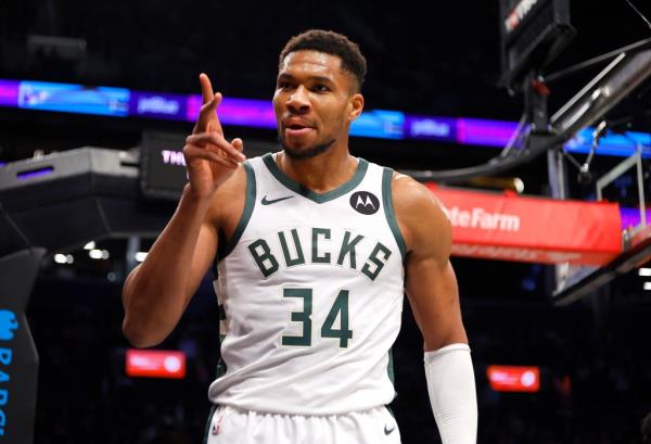 Bucks forward Giannis Antetokounmpo (34) reacts after scoring against the Brooklyn Nets during the first half at the Barclays Center on Dec. 8. 2024.