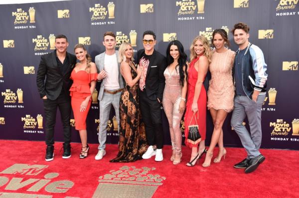 Jax Taylor, Brittany Cartwright, James Kennedy, Ariana Madix, Tom Sandoval, Scheana Marie, Stassi Schroeder, Kristen Doute, and Tom Schwartz of Vanderpump Rules attend the 2018 MTV Movie And TV Awards at Barker Hangar on June 16, 2018 in Santa Monica, California.  