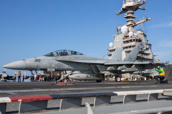 an F/A-18F Super Hornet launches from the flight deck of the world's largest aircraft carrier USS Gerald R. Ford in the Eastern Mediterranean Sea, October 11, 2023. 