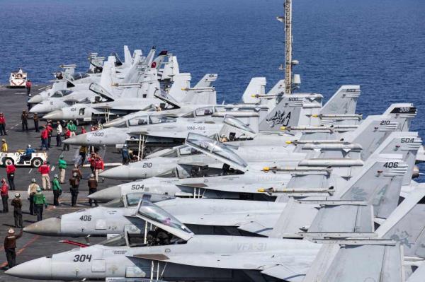 F/A-18 Super Hornets, attached Carrier Air Wing (CVW) 8, prepare for flight operations on the flight deck of the world's largest aircraft carrier USS Gerald R. For<em></em>d (CVN) 78 in the Eastern Mediterranean Sea, 