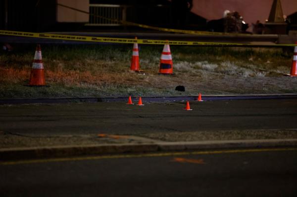 Police at the scene of the shooting on Beach 95th Street near Beach Channel Drive in Rockaway Beach.