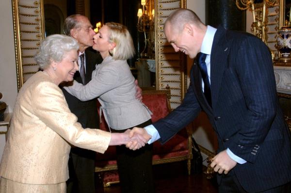 Queen Elizabeth II and the Duke of Edinburgh meet Zara Phillips and her then-boyfriend, England rugby player Mike Tindall at a Buckingham Palace reception to ho<em></em>nor the country's top achievers.   