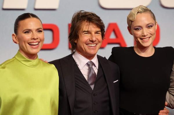 Tom Cruise and co-stars Haley Atwell (left) and Pom Klementieff attend the premiere of 