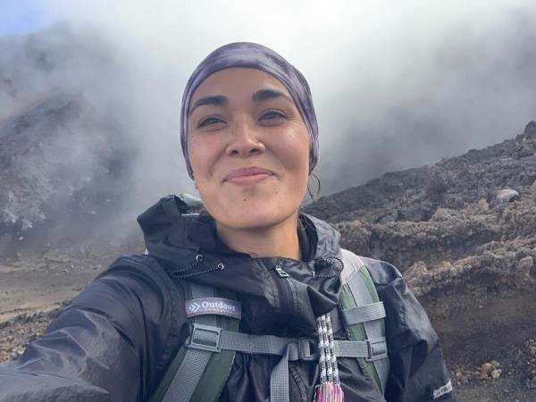 Hannah Kobayashi takes a selfie while hiking