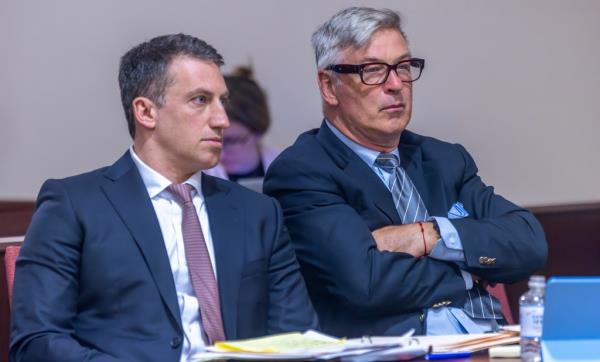 Attorney Alex Spiro, left, sits next to his client, actor Alec Baldwin in District Court in Santa Fe, N.M., during a preliminary hearing on Monday, July 8, 2024