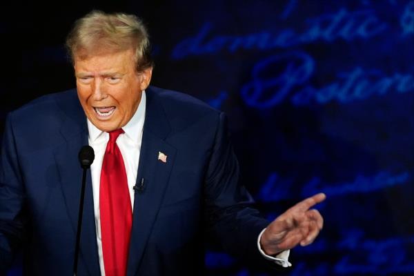 Republican presidential nominee former President Do<em></em>nald Trump speaks during a presidential debate with Democratic presidential nominee Vice President Kamala Harris at the Natio<em></em>nal Co<em></em>nstitution Center in Philadelphia, Tuesday, Sept. 10, 2024.