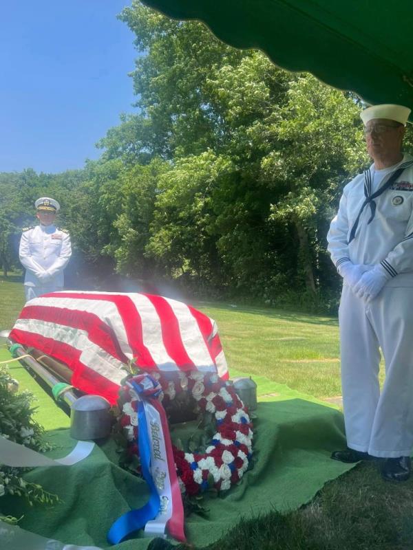 A flag draped over DiMartini's casket at his funeral ceremony.