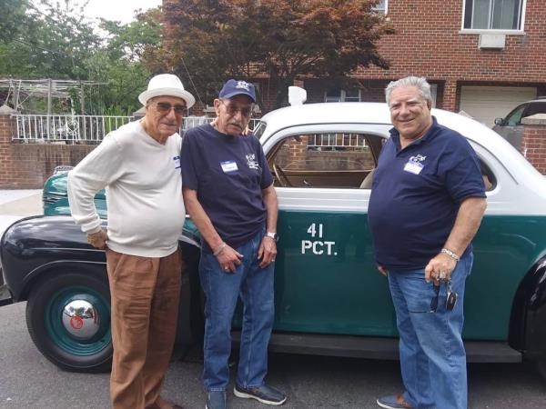 DiMartini pictured next to his first radio car form when he joined the NYPD.