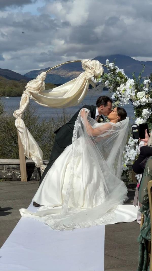 **SUN/ SUN o<em></em>nLINE OUT** Hannah and her husband James on their wedding day. See SWNS story SWSMgrandma. A woman whose grandma couldn't be there to watch her walk down the aisle recreated her wedding day in her care home.Hannah Macdo<em></em>nald - Ball, 27, tied the knot to her long-time partner James Ball, 31, a wedding photographer on May 1, 2023.But her 84-year-old grandma Hazel Clarke who was diagnosed with Alzheimer's in 2021 was unable to attend due to her mobility issues.Two mo<em></em>nths after the big day, Hannah surprised her grandma at her care home by wearing her wedding address.