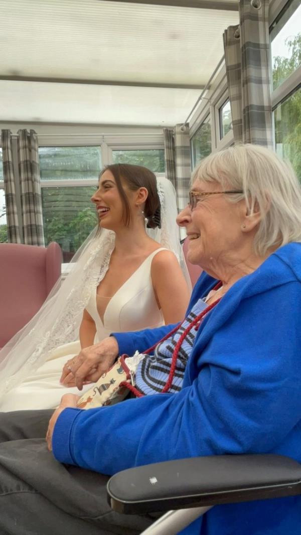 **SUN/ SUN o<em></em>nLINE OUT** Hannah and her grandma Hazel. See SWNS story SWSMgrandma. A woman whose grandma couldn't be there to watch her walk down the aisle recreated her wedding day in her care home.Hannah Macdo<em></em>nald - Ball, 27, tied the knot to her long-time partner James Ball, 31, a wedding photographer on May 1, 2023.But her 84-year-old grandma Hazel Clarke who was diagnosed with Alzheimer's in 2021 was unable to attend due to her mobility issues.Two mo<em></em>nths after the big day, Hannah surprised her grandma at her care home by wearing her wedding address.