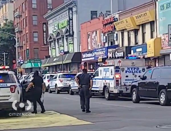 The NYPD respo<em></em>nds outside the Lexington Avenue and 125th Street station. 