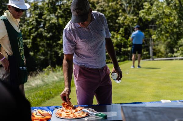 Golfers were eager to try pizza made in the Cybertruck.