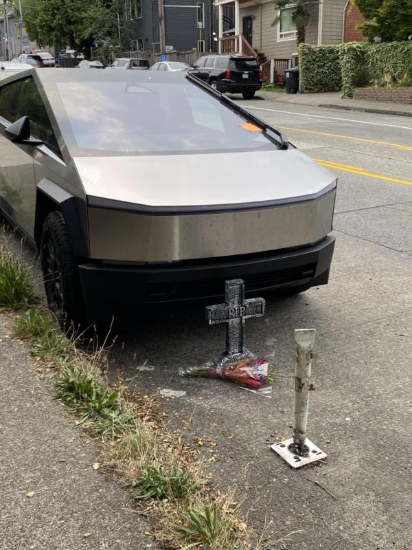 People left flowers and created a memorial around the busted vehicle.