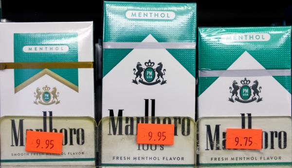 LOS ANGELES, CALIFORNIA - APRIL 28: Packs of menthol cigarettes are displayed for sale in a smoke shop on April 28, 2022 in Los Angeles, California. The Food and Drug Administration (FDA) is proposing to ban both menthol-flavored cigarettes and flavored cigars in a move hailed by public health experts which could potentially lead to 1.3 million people quitting smoking. (Photo by Mario Tama/Getty Images)