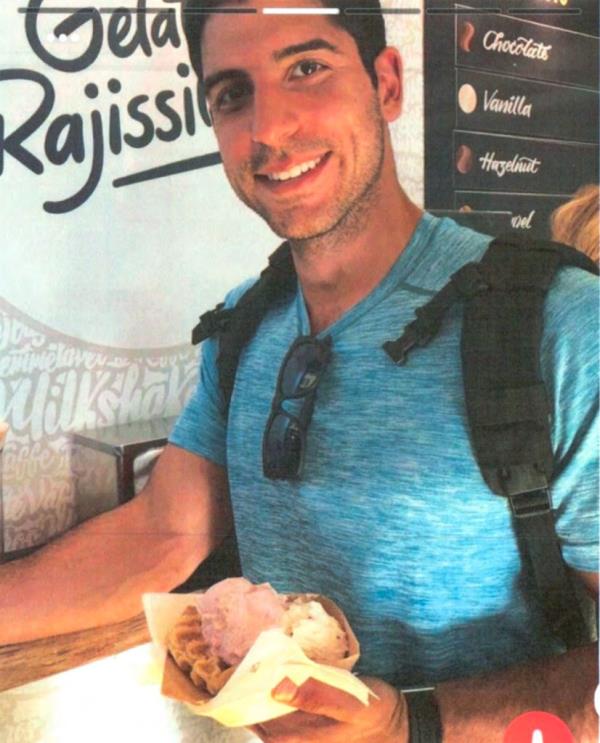 Nikko D’Ambrosio in an undated photo holding a waffle with ice cream. 