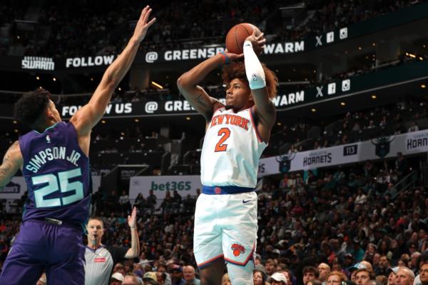 Miles McBride #2 of the New York Knicks shoots a three point basket during the game against the Charlotte Hornets.