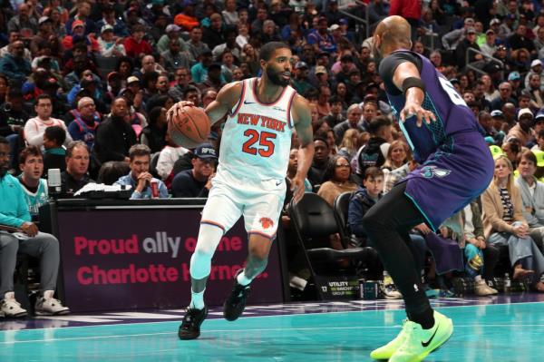 Mikal Bridges #25 of the New York Knicks looks on during the game against the Charlotte Hornets