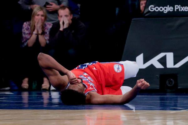 Joel Embiid shoots during the 76ers' Game 1 loss to the Knicks on April 21, 2024. 