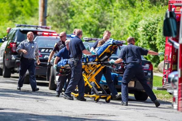 First respo<em></em>nders take Payton Leutner, 12, to an ambulance following the stabbing on May 31, 2014 in Waukesha, Wis.