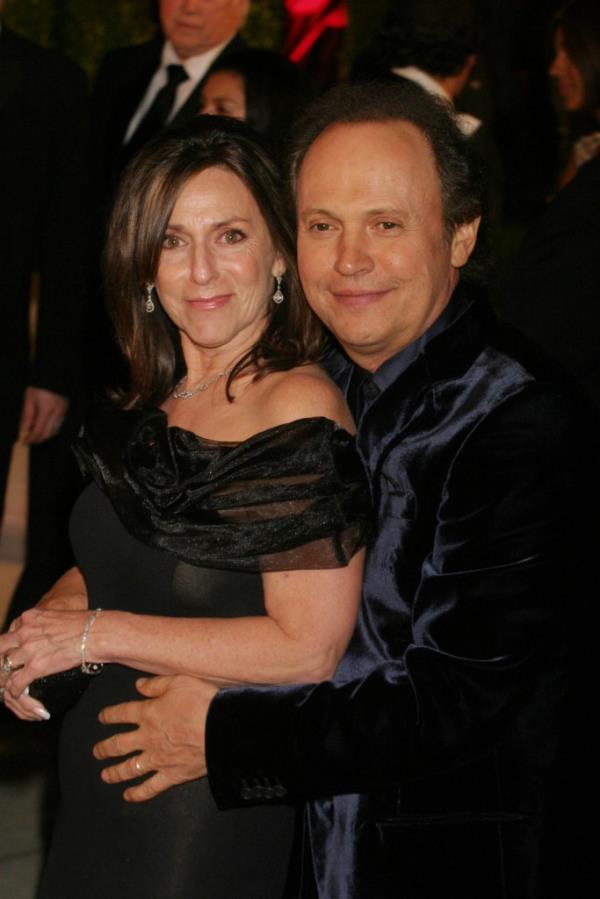 Billy Crystal and his wife Janice posing at the Vanity Fair Oscar party in Beverly Hills California, 2/29/04