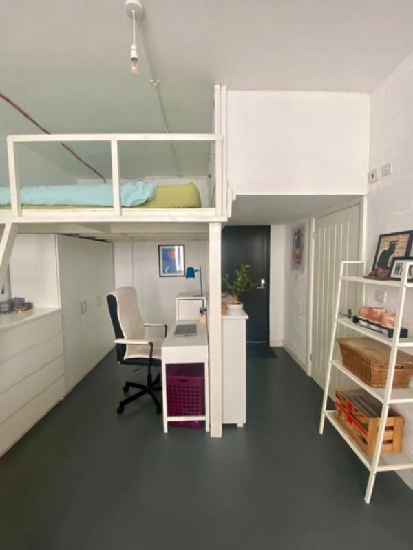 Story from Jam Press (Studio With Plants) Pictured: Inside the tiny studio flat. Plant potty! Tenants asked to water landlady?s 24 pot plants if they rent tiny 1,600-a-mo<em></em>nth studio flat A tiny studio flat is being let for a whopping 1,600-a-mo<em></em>nth and tenants have to water the landlady?s TWENTY FOUR pot plants, too. The one-bed pad is so cramped the bed is on a bespoke shelf with no headroom. It is accessed via a steep ladder and there is a desk to WFH underneath, plus a wardrobe and drawers. There is a two-seater sofa and a dining table with four seats near the pokey kitchenette. The separate bathroom has a shower cubicle, toilet and basin. Bills, except electricity, are included, but there is no parking or a garden, and pets are banned. But tenants are expected to water the plants described as ?o<em></em>nly a few.? The listing reads: ?Taking care of the owner's plants would be greatly appreciated, but not burdensome. ?As there are o<em></em>nly a few as shown in the pictures.? But twenty-two can be seen mainly in the living room area on shelves and tables, but there is also one in the toilet. The bedsit, in Schwartz Wharf, Hackney Wick, east London, is being let by OpenRent. As well as the sky-high rent a deposit of 1,846.15 is also required. The full listing reads: ?Be the first to call this fully furnished studio flat your own. ?This tastefully decorated and fully equipped apartment offers all the comforts of modern living. ?Featuring a fully stocked kitchen with all necessary appliances and kitchenware, you'll have everything you need to whip up delicious meals from the comfort of your own home. ?And with all bills included, including a fast fibre Internet connection, you'll have one less thing to worry a<em></em>bout each month. ?The o<em></em>nly excluded utility is electricity, which you'll be respo<em></em>nsible for. ?You'll find a cosy living space that's perfect for one person. ?The flat faces the serene bike parking area, ensuring a quiet and