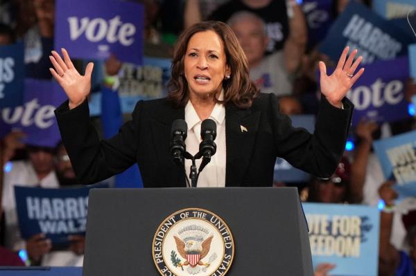 Vice President Kamala Harris, Democratic presidential nominee, speaking at a podium during a campaign event at East Carolina University in 2024