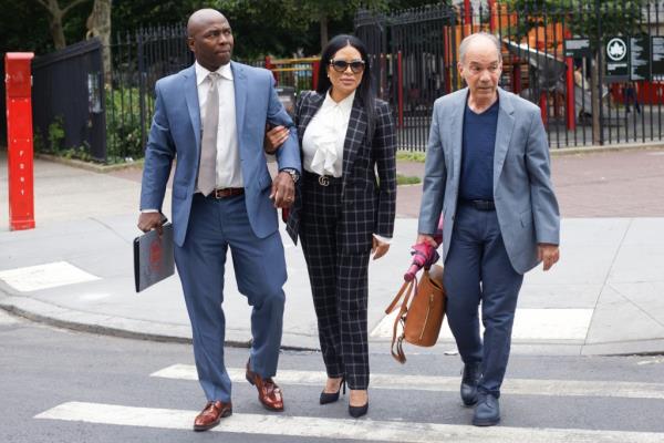 Jen Shah with her husband arriving to court.