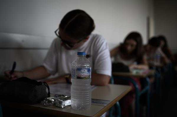 A studying taking a test. 