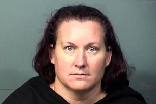 Mugshot of a woman named Ashley Nichole Pierce wearing a black shirt