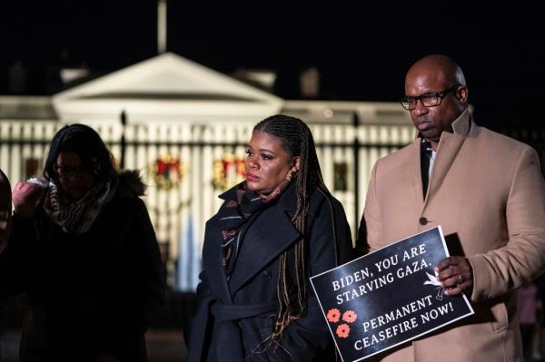 Rep. Cori Bush, D-Mo., middle, and Rep. Jamaal Bowman, D-N.Y., right, attend a vigil alo<em></em>ngside state legislators and faith leaders currently on hunger strike outside the White House to demand that President Joe Biden call for a permanent ceasefire in Gaza on Wednesday, Nov. 29, 2023.