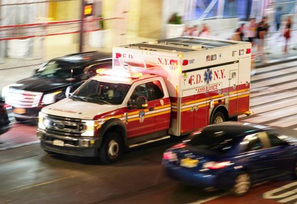 An FDNY ambulance respo<em></em>nding to an emergency on 42nd Street