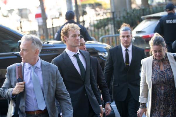 Daniel Penny arriving in court with his defense team.