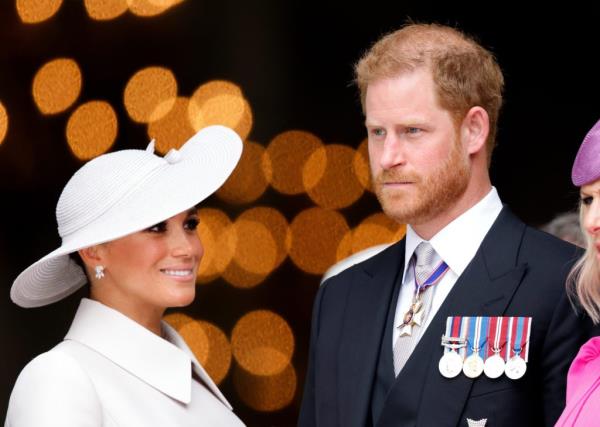 Meghan, Duchess of Sussex and Prince Harry, Duke of Sussex in military attire attending a Natio<em></em>nal Service of Thanksgiving for Queen Elizabeth II's Platinum Jubilee at St Paul's Cathedral