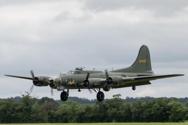 Boeing B-17G Flying Fortress 'Sally B' landing at the Duxford Summer Air Show: D-Day 80 in Duxford, Cambridgeshire, United Kingdom