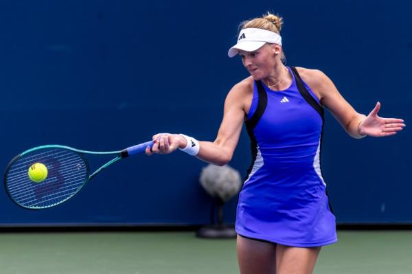 Ashlyn Krueger of USA returns a volley against Mirra Andreeva of Russia [21] during their round 2 singles match on Day 4 of the 2024 US Open at the USTA Billie Jean King Tennis Center.