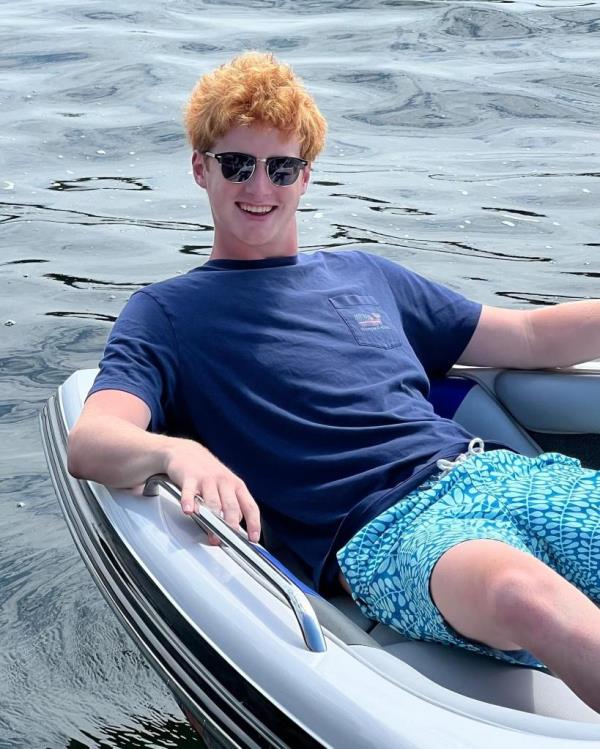 Flynn MacKrell floating on the water