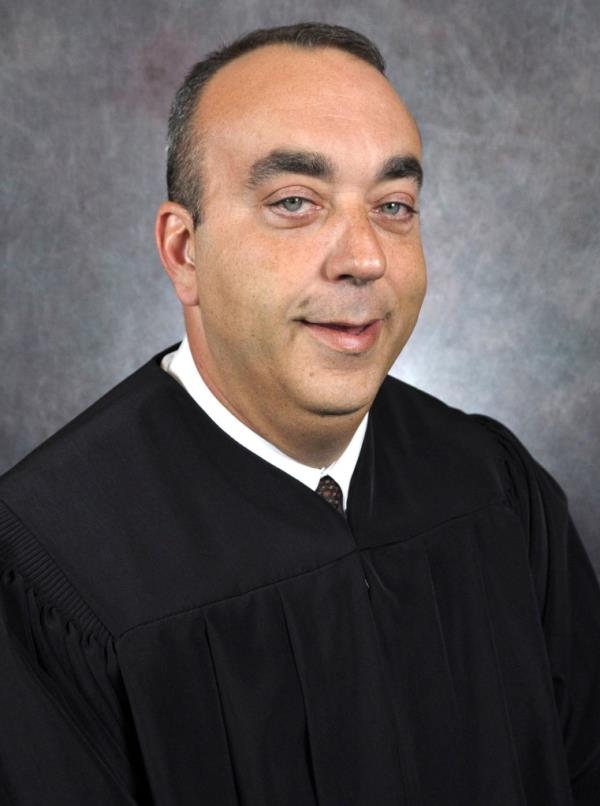 District Judge Kevin Mullins, whom a witness accused of helping run a sextortion scheme from the courthouse. 