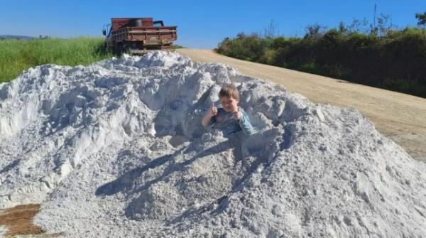 Arthur Emanuel Bitencourt, 7, poses with limestone in Ipiranga, Brazil, on Thursday, Aug. 3, 2023. He died while playing in the limestone. (Newsflash)