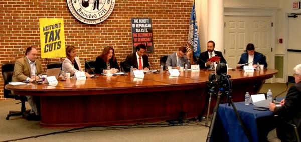 Group of Pennsylvania House Republican Committee members sitting at a table during a meeting discussing tax cuts