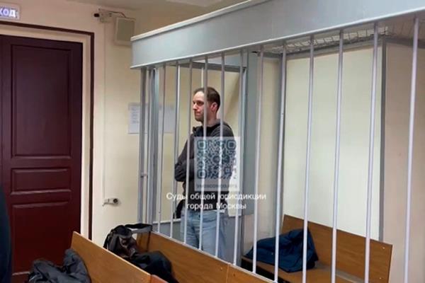 Wall Street Journal reporter Evan Gershkovich attends a hearing in Moscow court on whether his pretrial detention would be extended, on Jan. 26, 2024.