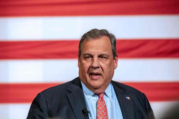 Close-up of Chris Christie in front of an American flag. 