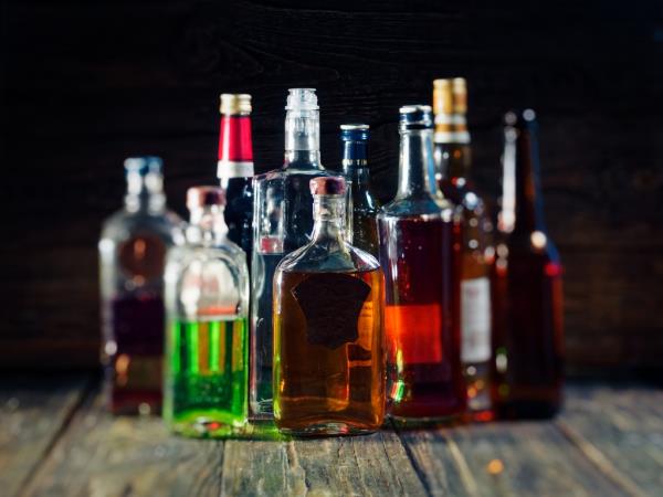 Group of various bottles of alcohol.