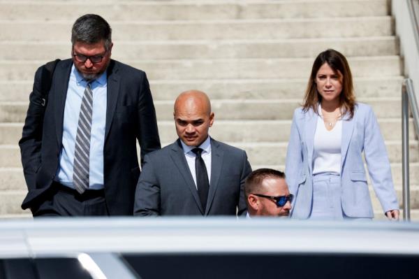 Walt Nauta, perso<em></em>nal aide to former U.S. President Do<em></em>nald Trump, and his lawyer Sasha Dadan leave the Alto Lee Adams Sr. U.S. Courthouse, in Fort Pierce, Florida, U.S. August 10.