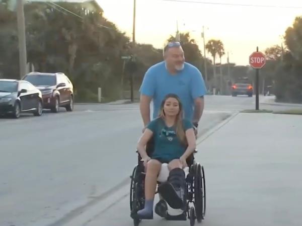  Kaitlin Dahme in a wheelchair after being run over 