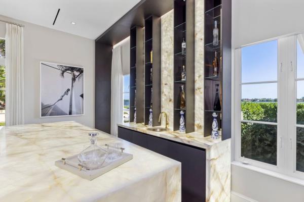 An ensuite marble bathroom. 