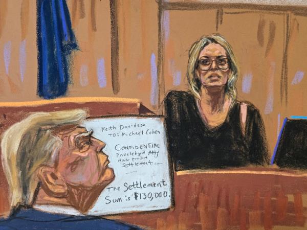 Former U.S. President Do<em></em>nald Trump watches as Stormy Daniels is questio<em></em>ned by prosecutor Susan Hoffinger during Trump's criminal trial on charges that he falsified business records to co<em></em>nceal mo<em></em>ney paid to silence porn star Stormy Daniels in 2016, in Manhattan state court in New York City, U.S. May 7, 2024 in this courtroom sketch.